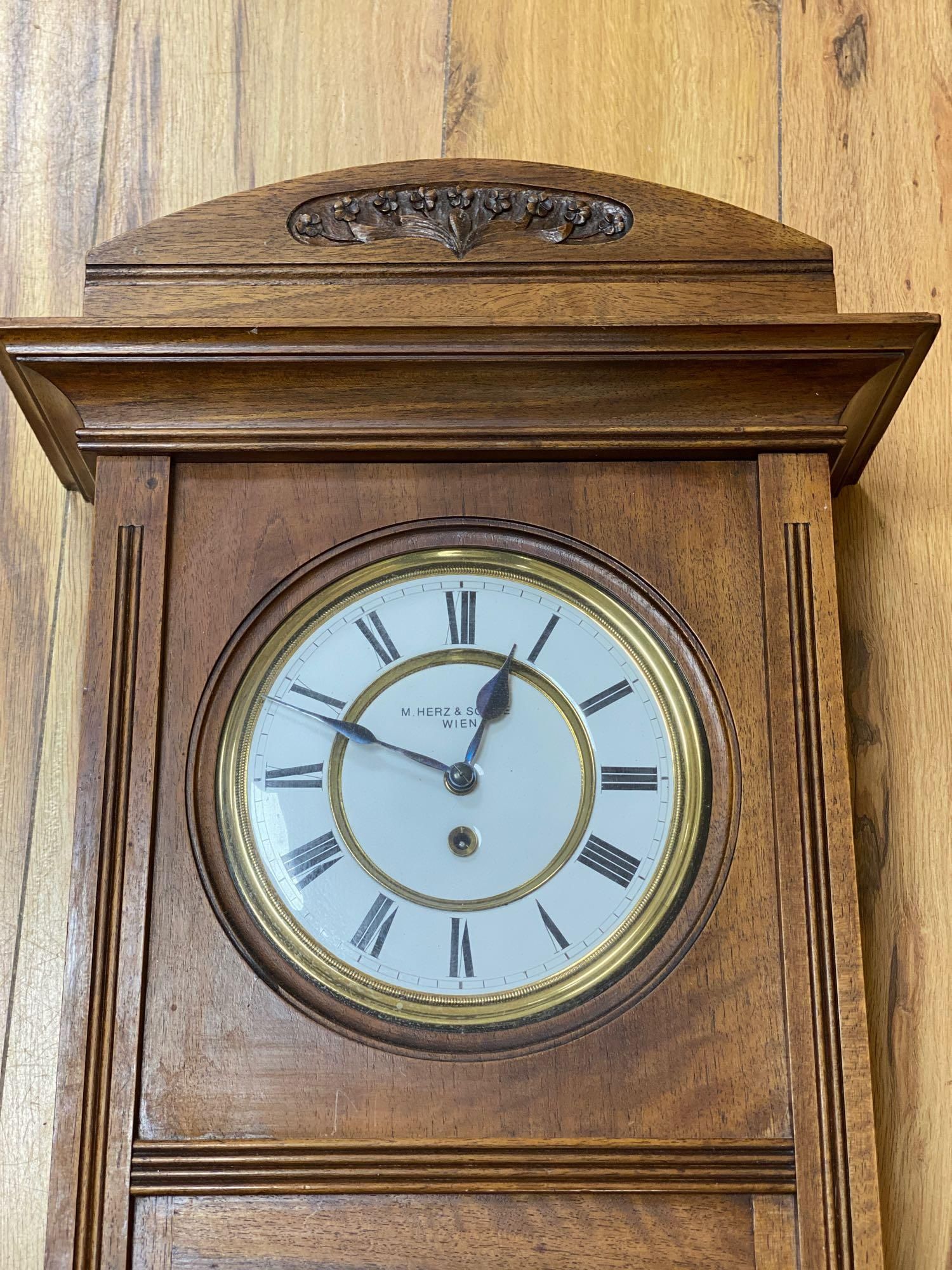 A 19th century walnut cased Vienna regulator, wall timepiece, 16cm enamel dial signed M. Herz & Son, timepiece movement,100cm high